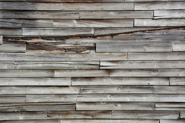 Weathered wood siding on an abandoned rural general store