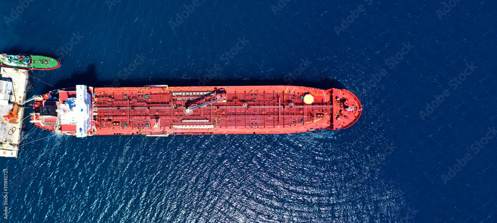 Wall mural aerial drone ultra wide photo of industrial petrochemical oil and gas fuel tanker ship cruising medi