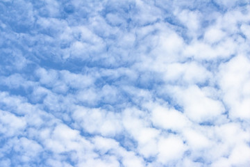 White clouds in the blue sky. Background. Texture