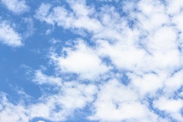 White clouds in the blue sky. Background. Texture