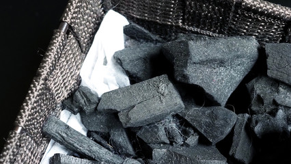 Top view or bird eye view images  of black charcoal from real wood of nature which use for cooking in kitchen or absorbant odor in restroom or anywhere in house and ingrediant in cosmetics or health 