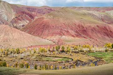 Red hillsides in the valley of the Kyzylshin river. Kosh-Agachsky District, Altai Republic, Russia