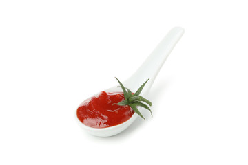 Tasty tomato sauce in ceramic spoon isolated on white background