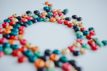 colorful beads on a white background and circle copyspace