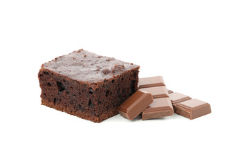 Chocolate cake slice and chocolate isolated on white background