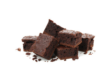 Heap of delicious chocolate cake slices isolated on white background