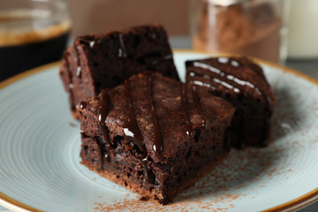 Plate with delicious chocolate cake slices, close up