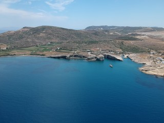 Obraz premium Milos, Greece Papafragas Beach and Caves view from the drone with visitors at sunny weather