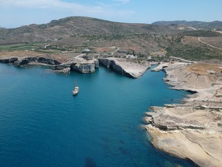 Fototapeta premium Milos, Greece Papafragas Beach and Caves view from the drone with visitors at sunny weather