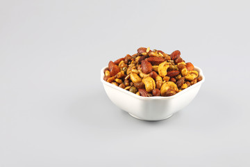 Indian traditional snack mixture with cashew nut and almond
