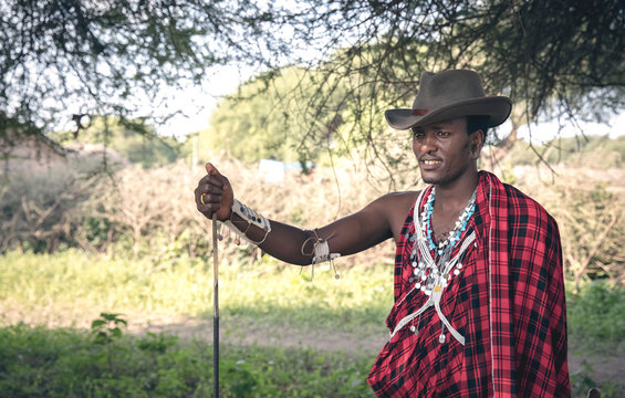 handsome maasai warrior in a cowboy hat