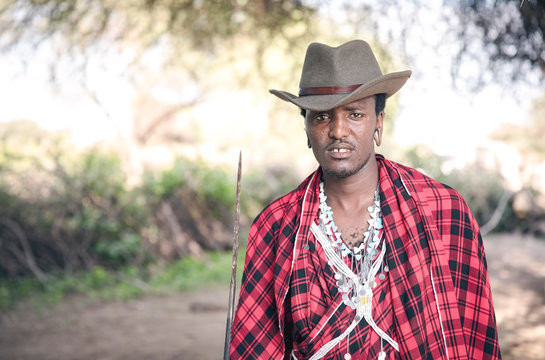 handsome maasai warrior in a cowboy hat