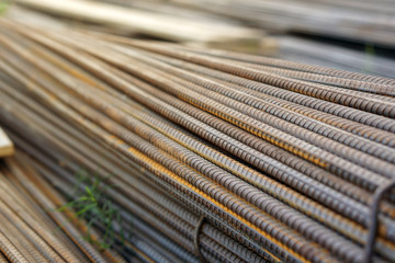 abstract metal background of steel pipes. Construction rebar steel work reinforcement in conncrete structure of building