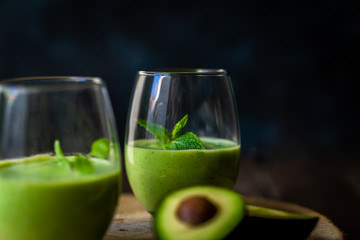 Green avocado milkshake. Delicious and healthy smoothie