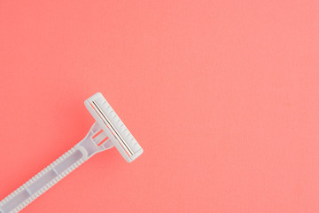 Plastic Razor Isolated On Pink Background, White Plastic Razor