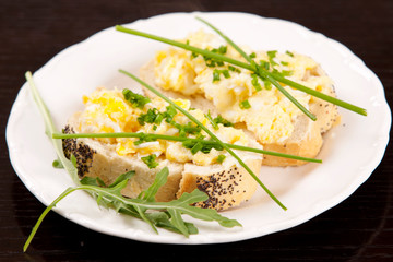 Delicious fresh scrambled eggs and chives sandwich