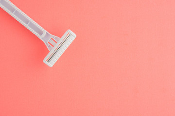 Plastic Razor Isolated On Pink Background, White Plastic Razor