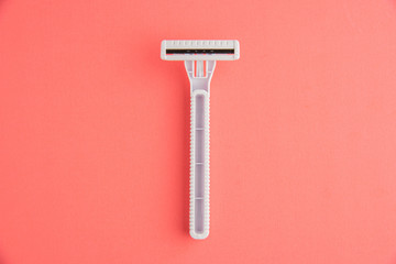 Plastic Razor Isolated On Pink Background, White Plastic Razor