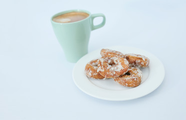 Kuih Keria or sweet potato rings isolated with white background