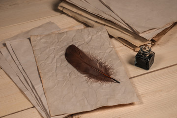 Feather and old papers