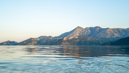 View from a kayak at sunset of Lake Skadar (Scutari Shkodër Shkodra), which lies on the border of Albania and Montenegro, and is the largest lake in Southern Europe.