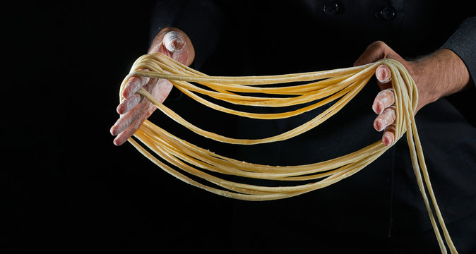 Chef Makes Noodles By Hand. Hand Pulled Noodles