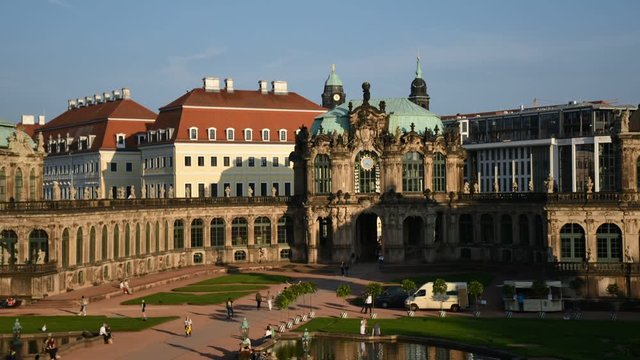 Timelapse footage in Zwinger palace, Saxony, Dresden. Happy holiday with large crowd of people, blue sky, sunny day in Zwinger, view from balcony