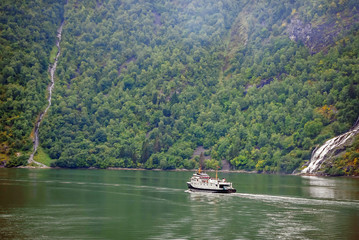 Cruise ship in the fjords  between Hellyst and Geiranger