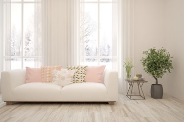 Stylish room in white color with sofa and winter landscape in window. Scandinavian interior design. 3D illustration