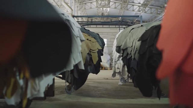 Piles of dyed leather last stage of production. Leather is ready for sewing