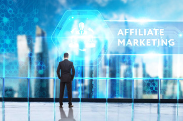 Business, Technology, Internet and network concept. Young businessman working on a virtual screen of the future and sees the inscription: Affiliate marketing