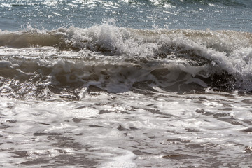 Beautiful turquoise sea with sunlight and the waves