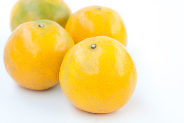 fresh oranges on white background