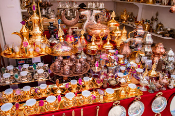 Traditional handmade tea and coffee sets or teapots for sale at the bazar souvenir market in Istanbul, Turkey