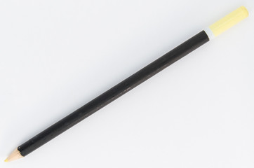 Yellow and black pencil