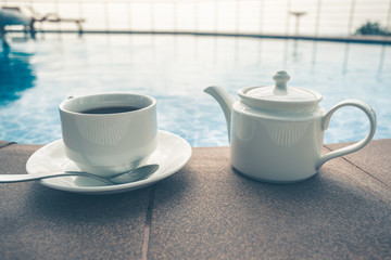 tea set on plate near spa pool