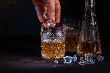 Whiskey in glass with ice