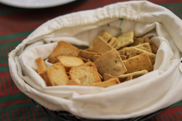 Pile of  mini toasts in a table