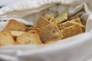 Pile of  mini toasts in a table