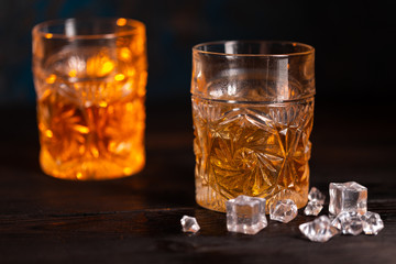 Whiskey in glass with ice