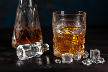 Whiskey in glass with ice