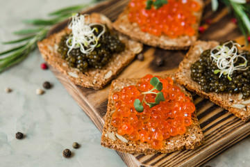 chic expensive red caviar, pike caviar and black caviar for a snack