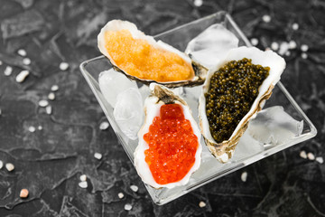 chic expensive red caviar, pike caviar and black caviar for a snack
