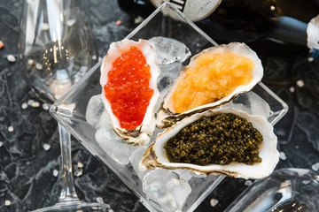chic expensive red caviar, pike caviar and black caviar for a snack