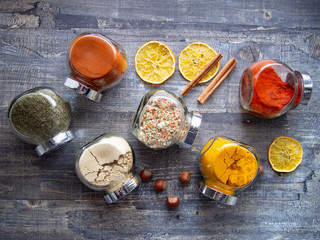 Bright aromatic spices in glass jars