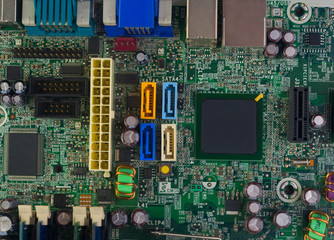  computer motherboard with microchips and electrical parts