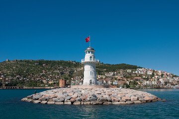 View of landscape and lghthouse of Alanya port with Turkish flag, Alanya, Turkey - 311931339