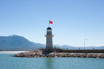 View of landscape and lghthouse of Alanya port with Turkish flag, Alanya, Turkey - 311931366