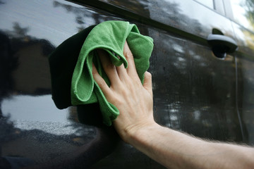 waterless car wash, human hand work - 311931382