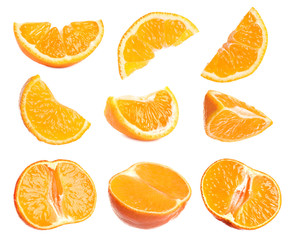 Set of cut fresh juicy tangerines on white background